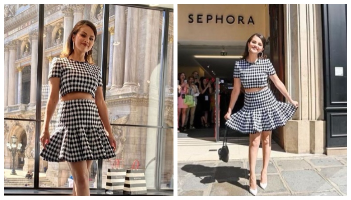 Selena Gomez puts her enviable physique on display in crop top and mini skirt