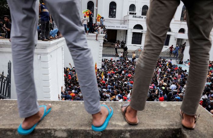 Demonstrators protest inside the Presidents House premises, after President Gotabaya Rajapaksa fled, amid the countrys economic crisis, in Colombo, Sri Lanka July 9, 2022. Photo: Reuters