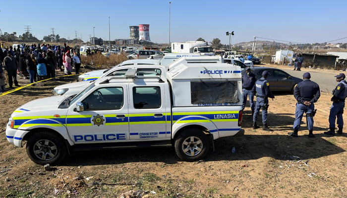 Police cordon off the scene where 15 people were killed by unknown gunmen inside a tavern, in Nomzamo, Soweto, Johannesburg, South Africa, July 10, 2022. — Reuters/Siyabonga Sishi