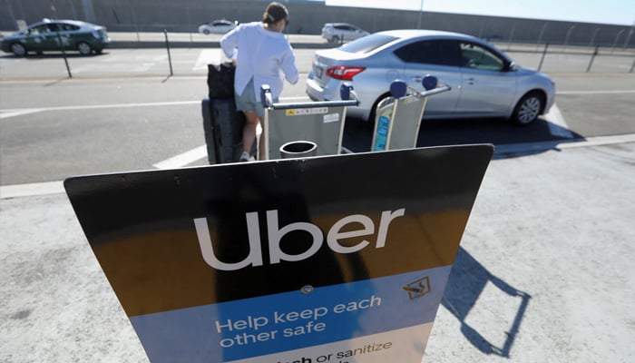 Uber signage is posted at Los Angeles International Airport (LAX) in Los Angeles, California, US July 10, 2022. -REUTERS