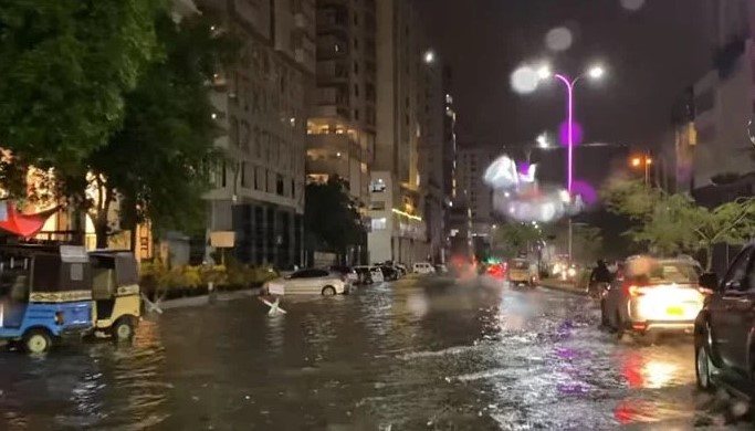 Screengrab of a Karachi street inundated with rainwater. — Twitter