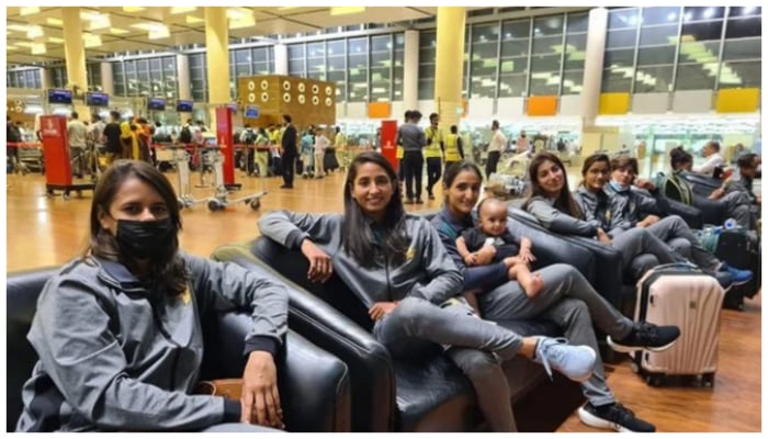 Image showing the Pakistan womens cricket squad, including skipper Bismah Maroof and her daughter Fatima, while waiting at the airport. — PCB