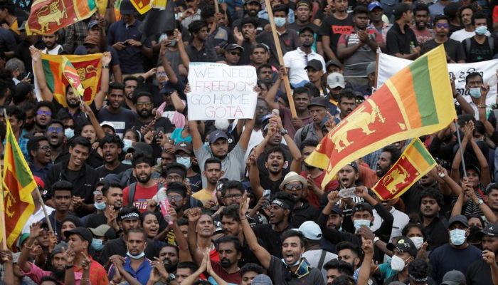 Demonstrators celebrate after entering into the Presidential Secretariat, after President Gotabaya Rajapaksa fled, amid the countrys economic crisis, in Colombo, Sri Lanka July 9, 2022. — Reuters