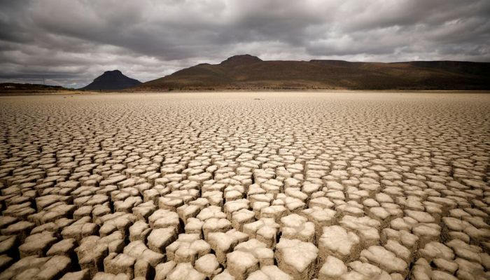 Clouds gather but produce no rain as cracks are seen in the dried up municipal dam in drought-stricken Graaff-Reinet, South Africa, November 14, 2019. Picture taken November 14, 2019. — Reuters