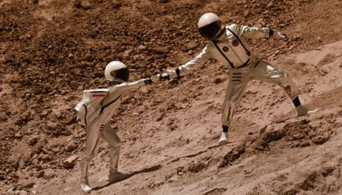 Astronauts Helping Each Other. — Unsplash