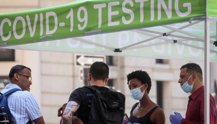 People wait to take coronavirus disease (COVID-19) tests at a pop-up testing site in New York City, US, July 11, 2022. — Reuters/File