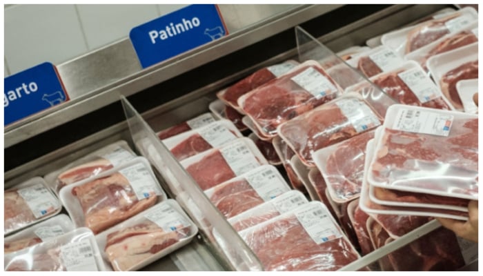 Image showing packs of frozen meat in a refrigerator. — AFP