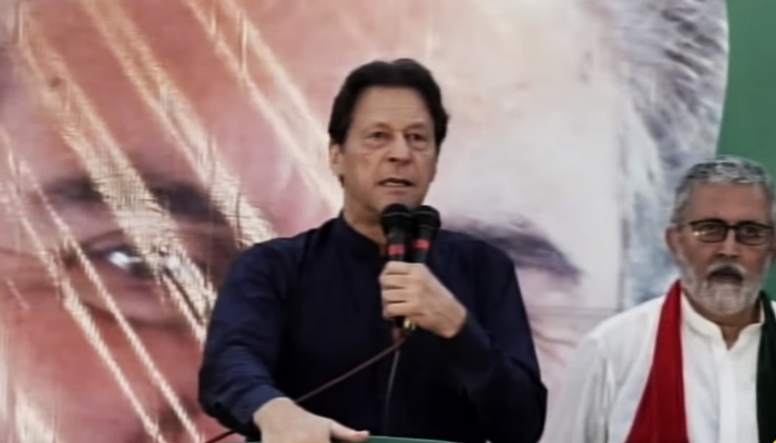 PTI Chairman Imran Khan addressing a jalsa in Dera Ghazi Khan, on July 14, 2022, in connection with the by-election in Punjab that will take place later this month. — YouTube screengrab