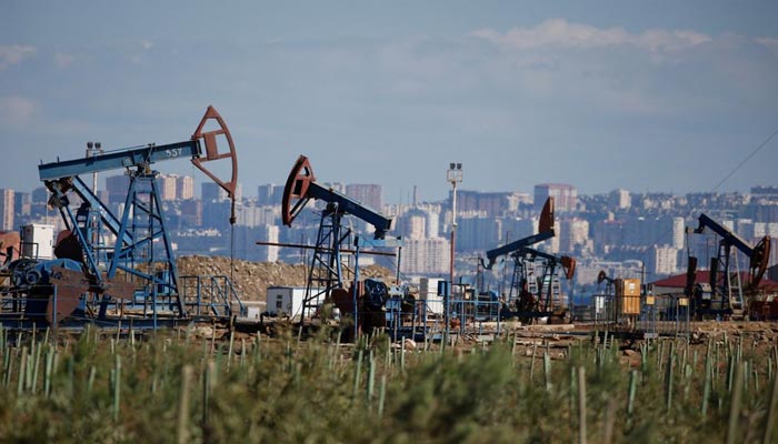 Pump jacks pump oil at an oil field on the shores of the Caspian Sea in Baku, Azerbaijan, October 5, 2017. — Reuters/File