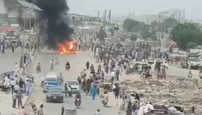 The picture shows people protesting at Sohrab Goth in Karachi on July 14, 2022. — Screengrab/Twitter