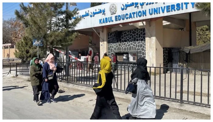 Students walk outside a university in Kabul. — Reuters/File