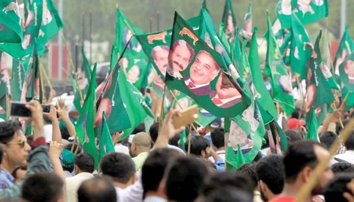 PML-N supporters take part in a rally. — Reuters/File
