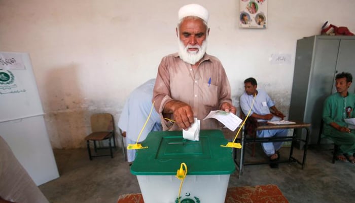 A voter casts his vote at a polling station during the first provincial elections in Jamrud, Pakistan July 20, 2019. — Reuters