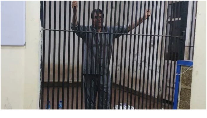 PTI leader Shahbaz Gill could be seen standing behind bars in this picture. — Twitter/SHABAZGIL