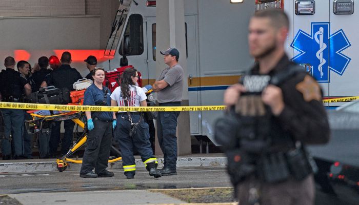 Emergency personnel gather after a shooting at Greenwood Park Mall in Greenwood, Indiana, US July 17, 2022. - Reuters