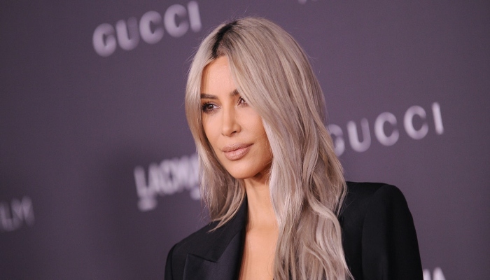 Kim Kardashian fails to spell Rapunzel as she channels her long blonde hair  look