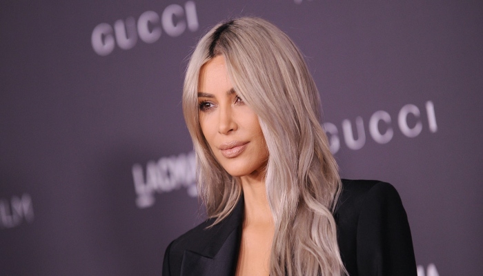 Kim Kardashian fails to spell Rapunzel as she channels her long blonde hair look Kim Kardashian fails to spell Rapunzel as she channels her long blonde hair look