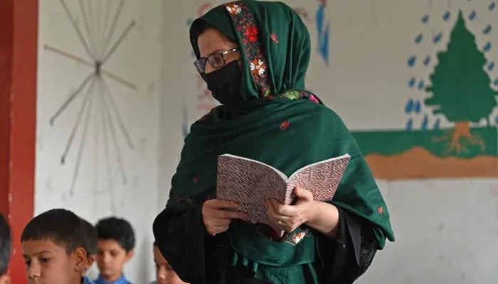 A teacher at a school in Kabul, Afghanistan. — AFP/File