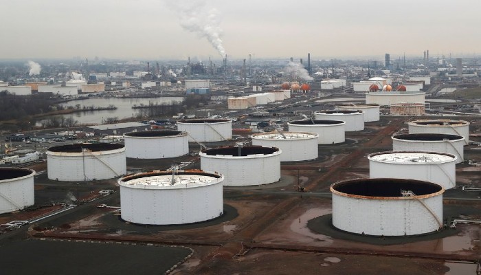 General view of oil tanks and the Bayway Refinery of Phillips 66 in Linden, New Jersey, US, March 30, 2020. —REUTERS/Mike Segar