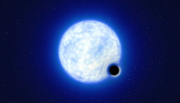 An artist’s impression showing what the binary star system VFTS 243 – containing a black hole and a large luminous star orbiting each other - might look like if we were observing it up close is seen in this undated handout image. The system, which is located in the Tarantula Nebula in the Large Magellanic Cloud galaxy, is composed of a hot, blue star with 25 times the sun’s mass and a black hole, which is at least nine times the mass of the sun. — Reuters