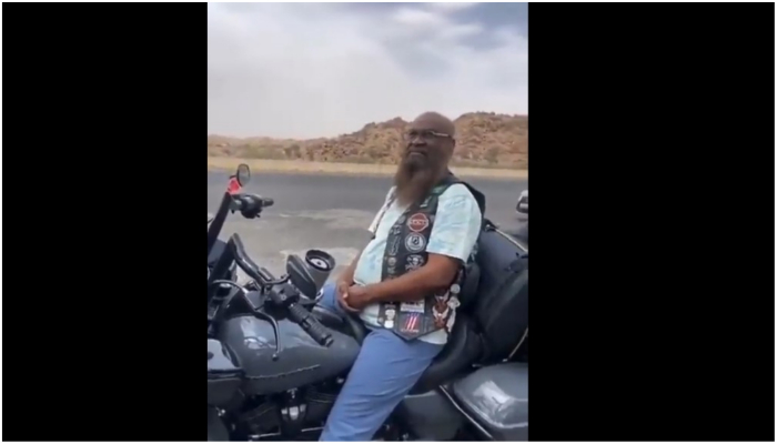 Screengrab of video showing former Imam of Saudi Arabias Grand Mosque Sheikh Adel al-Kalbani riding a Harley Davidson. — Twitter/ @msary20082000