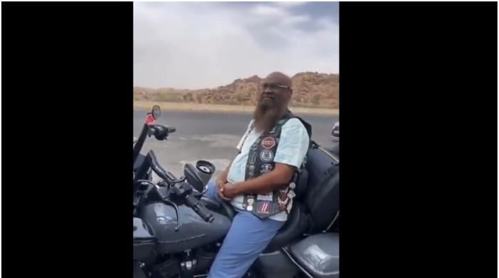 WATCH: Ex-imam of Saudi Arabia's Great Mosque rides heavy bike