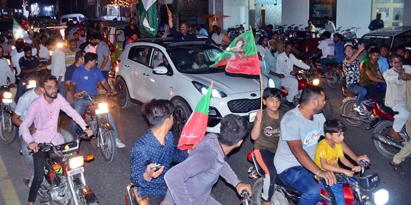 PTI workers celebrating victory after Punjab by-election PP-217 on July 18, 2022. — APP