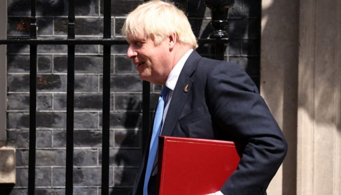British Prime Minister Boris Johnson walks outside Downing Street in London, Britain, July 20, 2022. — Reuters