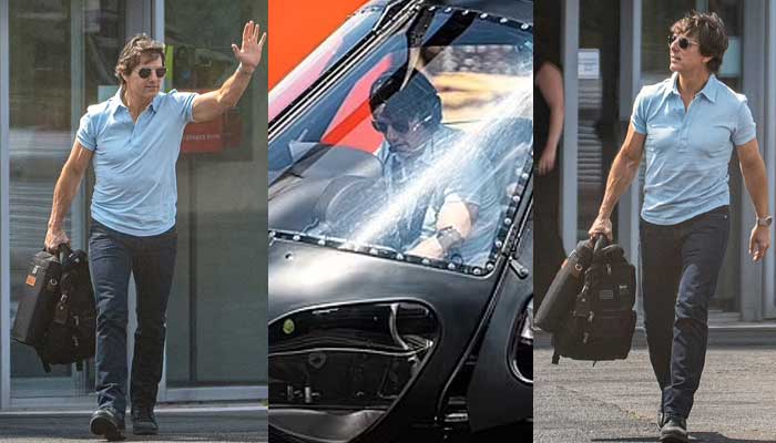 Tom Cruise shows off his ripped physique and muscular arms as he lands chopper in London