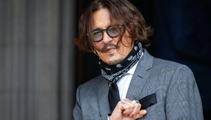 Johnny Depp gives fans a peek into his shocking transformation for  'Minamata'