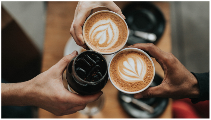 Representational image of people holding coffee cups. — Pixabay/ StockSnap