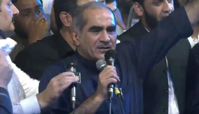 Federal Minister for Railways and Aviation Saad Rafique addresses a public gathering at Lahores Liberty Chowk. — Twitter Screengrab