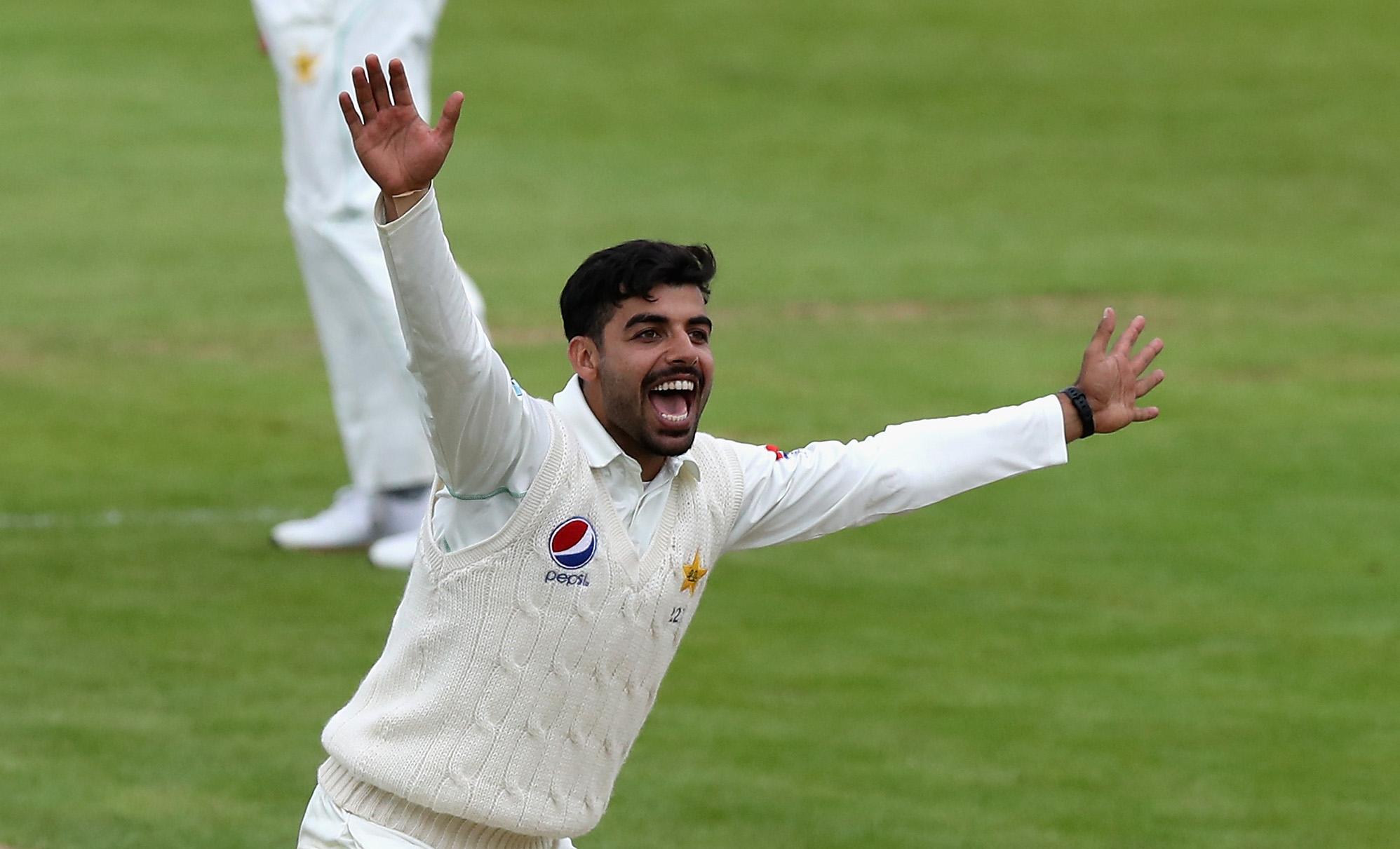 Pakistans white-ball cricket vice-captain Shadab Khan celebrates taking a wicket in a Test match. --ICC