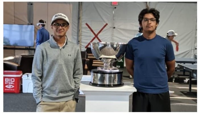 Pakistans Omar Khalid (right) and Yashal Shah pose with the US Junior Amateurs trophy here at Bandon Dunes Golf Resort on Sunday. — Press release