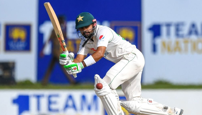 Pakistan skipper Babar Azam hits a shot during the second day of the second cricket Test match between Sri Lanka and Pakistan at the Galle International Cricket Stadium in Galle on July 25, 2022. — AFP