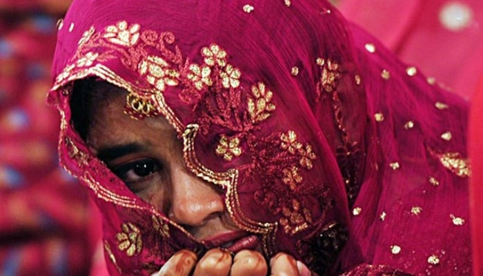 A Pakistani bride in a mass wedding ceremony in Karachi. — AFP/File