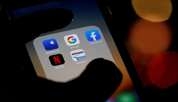 The logos of mobile apps, Google, Amazon, Facebook, Apple and Netflix, are displayed on a screen in this illustration picture taken December 3, 2019. —REUTERS/Regis Duvignau