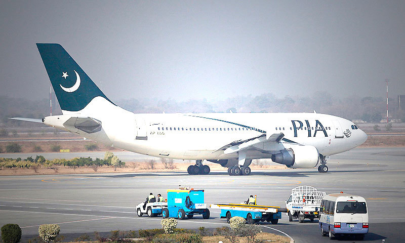 A Pakistan International Airlines (PIA) plane prepares to take off at Alama Iqbal International Airport in Lahore — Reuters/File