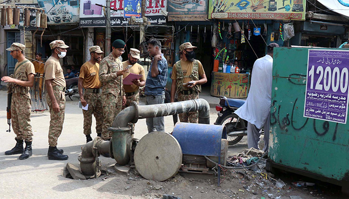 Army officials oversee ASA pumping stations and the main drain of the city along with WASA officials as the city administration prepares before heavy rains in Hyderabad, on July 20, 2022. — INP