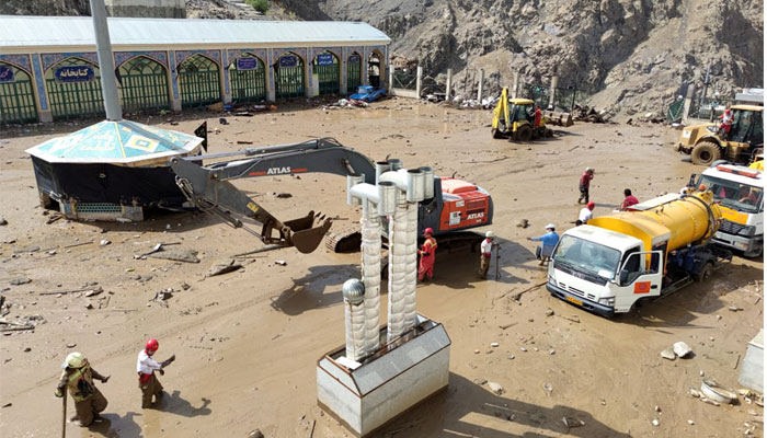 Rescuers work following the flood in Imamzadeh Davoud village in the north of Tehran, Iran July 28, 2022.—  Iranian Red Crescent Society/WANA/Handout via Reuters