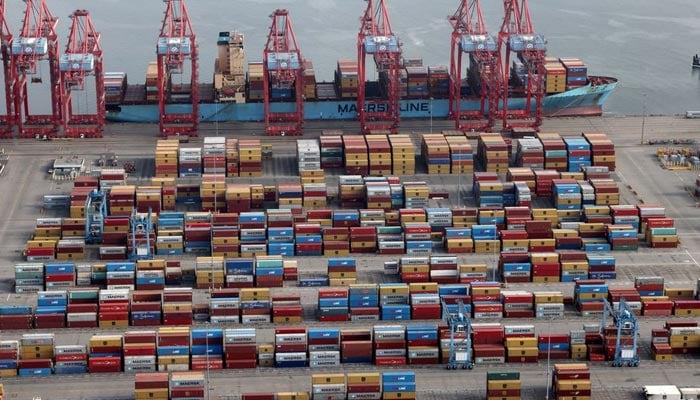 Shipping containers are unloaded from a ship at a container terminal at the Port of Long Beach-Port of Los Angeles complex, in Los Angeles, California, US, April 7, 2021. — Reuters/File