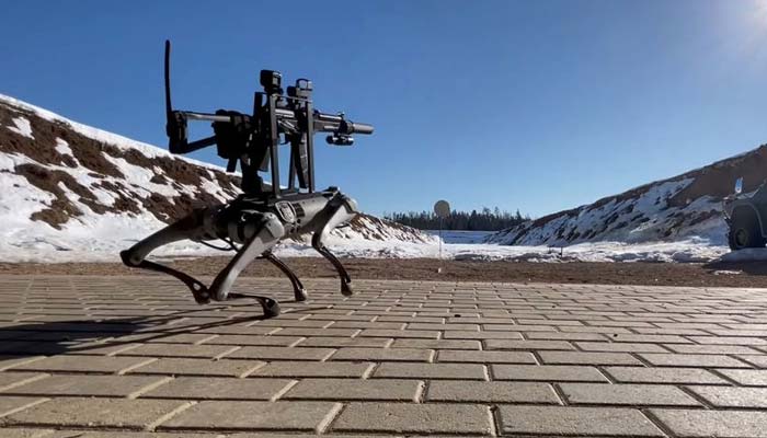 Killer robot, as named by many online commenters, is seen firing at two targets as it creepily paces.—Alexander Atamanov/Facebook