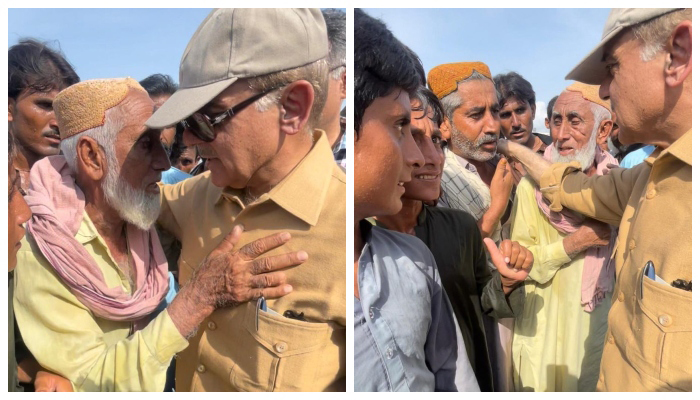 Prime Minister Shehbaz Sharif meets flood affectees during his visit to Balochistan, on July 30, 2022, after heavy rains wreaked havoc in the province.  - APP