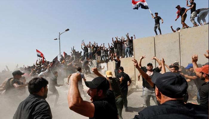 Supporters of Iraqi Shiite cleric Moqtada al-Sadr protest against corruption, in Baghdad, Iraq July 30, 2022. — Reuters