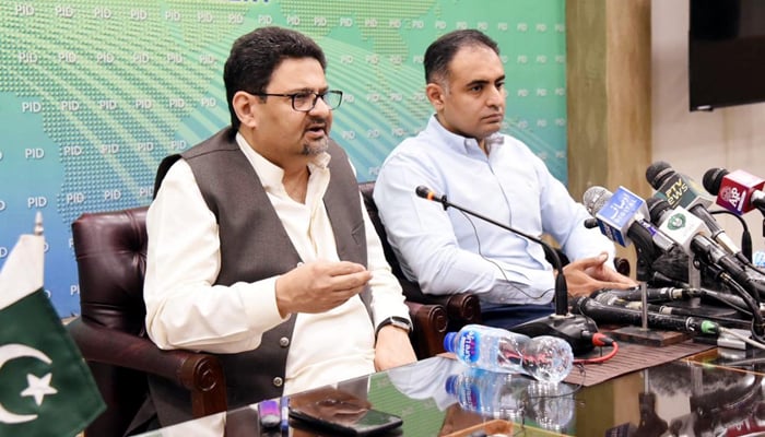 Minister for Finance Miftah Ismail and coordinator to PM for economy and energy, Bilal Azhar Kiani, addressing a press conference, in Islamabad, on July 31, 2022. — PID