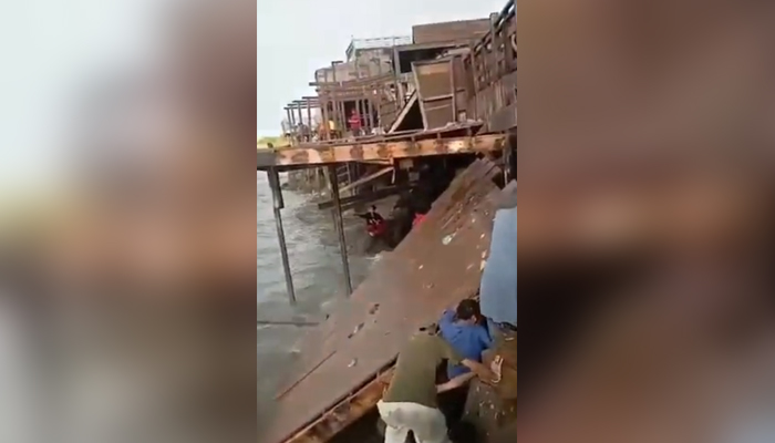 People seen rescuing others after a portion of a restaurant collapses at Karachis Do Darya, on August 1, 2022. — Twitter/YusraSAskari