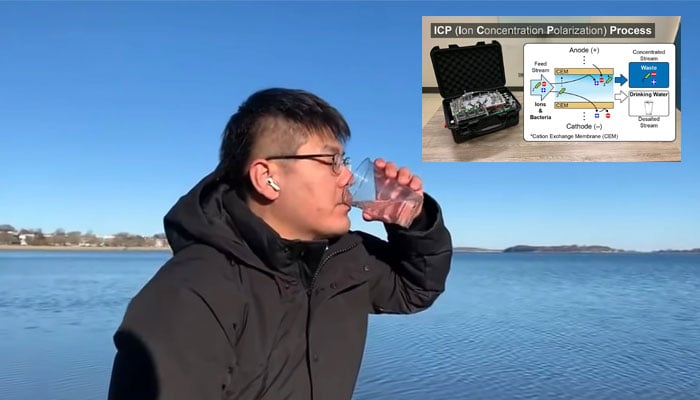 Jongyoon Han drinks seawater that he converted to drinking water with his device.—Screengrab from YouTube/J-WAFS at MIT