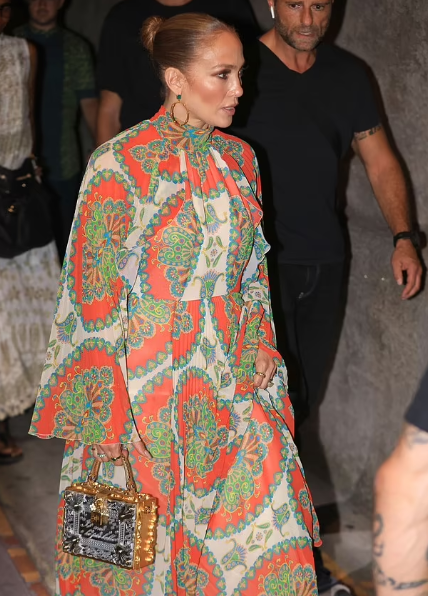 Jennifer Lopez drops jaws in bold orange dress as she steps out for dinner in Capri