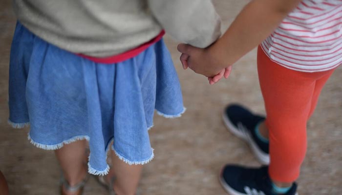 A representational image of children holding hands. — AFP/File