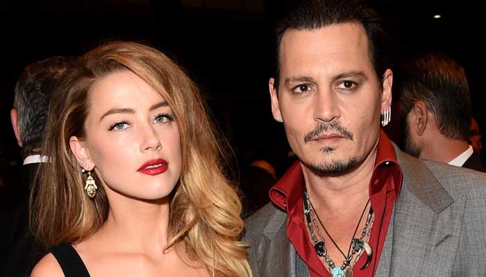 Johnny Depp kicked Amber Heard?